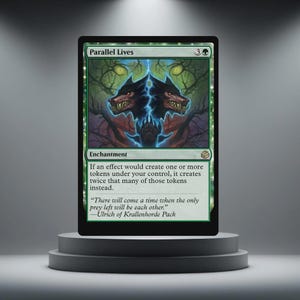 May include: A green Magic: The Gathering card named "Parallel Lives." The card shows a dark illustration of two snarling wolf-like creatures with glowing eyes, split by a blue lightning bolt. The card is displayed on a grey pedestal.