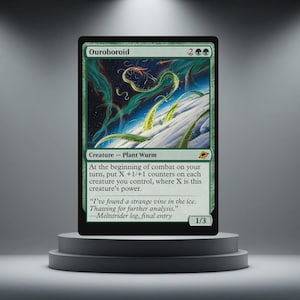 May include: A green Ouroboroid card from a trading card game. The card features an illustration of a plant wurm in a snowy landscape. Text on the card describes the creature's abilities and flavor text.