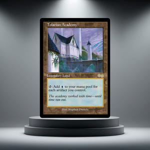 Peut inclure: Une carte Magic: The Gathering intitulée "Tolarian Academy". La carte présente une illustration d'un bâtiment blanc avec des accents bleus, sur fond de ciel bleu. Le texte comprend "Legendary Land" et des instructions de jeu.