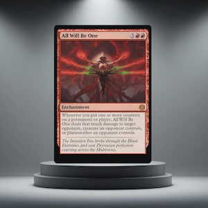 May include: A red Magic: The Gathering card, "All Will Be One", on a grey pedestal. The card displays an illustration of a figure with outstretched arms and red and green accents. The text describes the enchantment's effects.