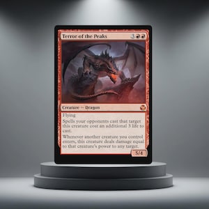 May include: A red Magic: The Gathering card titled "Terror of the Peaks" featuring a dragon illustration. The card is a creature with flying ability and stats of 5/4. The card is displayed on a black pedestal.