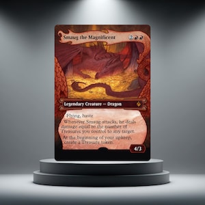 May include: A collectible trading card titled Smaug the Magnificent, featuring a red dragon resting on a pile of gold coins. The card displays game text, including Flying, haste, and power/toughness stats of 4/3, framed by a decorative border.