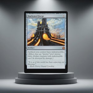 May include: A Magic: The Gathering card, "Darksteel Forge," displayed on a grey pedestal. The card features an illustration of a dark, metallic structure with glowing orange accents against a cloudy sky. The card text describes the artifact's abilities.