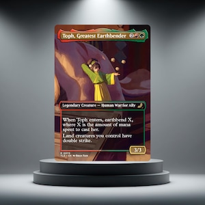 May include: A rectangular trading card titled Toph, Greatest Earthbender featuring a character in a green and yellow outfit manipulating floating rocks. The card text includes Legendary Creature, Human Warrior Ally, and game rules with a 3/3 power.