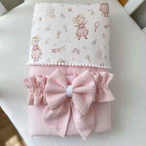 Muslin Baby Girl Blanket with Pom Poms & Bow – Warm Organic Cotton Gift