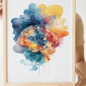May include: Watercolor painting of a human brain with a network of lines and dots, set against a backdrop of colorful watercolor washes in blue, yellow, and orange. The artwork is framed in a light wood frame.