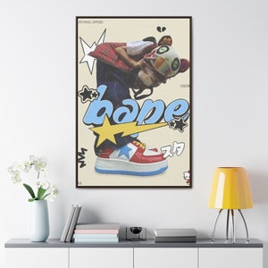 May include: A vintage-style poster with a cartoon character wearing a red and black plaid shirt and a blue and white hat. The character is holding a large, colorful plush toy. The poster features the word "bape" in blue and yellow letters with a yellow star and lightning bolt. The poster also includes the text "Athing Ape®" and "1993®".