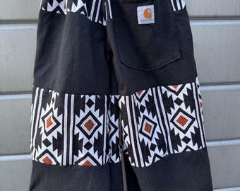Tiny pants. Big style. Reworked Carhartt.