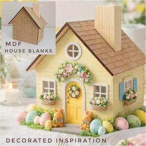 May include: A decorative yellow house with a brown roof, chimney, and door. The house is decorated with floral arrangements, Easter eggs, and bunny figurines. The text "MDF HOUSE BLANKS" and "DECORATED INSPIRATION" are visible.