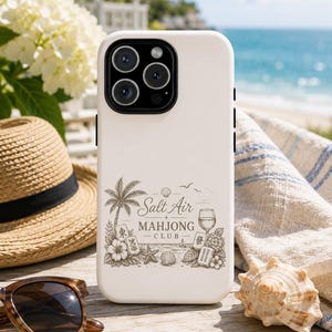 May include: A matte off-white smartphone case featuring a detailed dark brown line art illustration. The design includes a palm tree, hibiscus flowers, seashells, a wine glass, and mahjong tiles with the text Salt Air Mahjong Club.