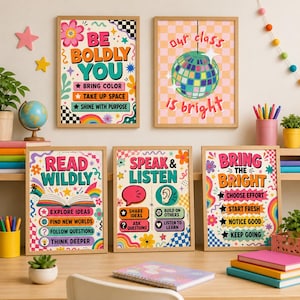 May include: Five rectangular wall posters in wooden frames featuring colorful graphic designs and motivational text. The prints include phrases like BE BOLDLY YOU, OUR CLASS IS BRIGHT, READ WILDLY, SPEAK & LISTEN, and BRING THE BRIGHT with disco ball art.