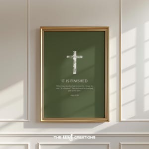 May include: A green and white printable wall art print with a cross and the text "IT IS FINISHED" with a bible verse from John 19:30.
