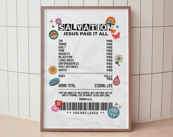 May include: A framed print with the words "SALVATION JESUS PAID IT ALL" in a colorful design. The print lists sins and debts as "PAID" and includes the text "ETERNAL LIFE" and "YOU ARE LOVED".