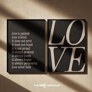 May include: Two framed art prints with a black background. One print features the word "LOVE" in large, cream-colored letters. The other print displays a poem about love in cream-colored text. The URI Creations logo is at the bottom.