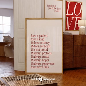 May include: Three framed art prints with inspirational quotes. The largest print features the text "love is patient, love is kind." A smaller print reads "Let all that you do be done in love." A red print says "LO VE."