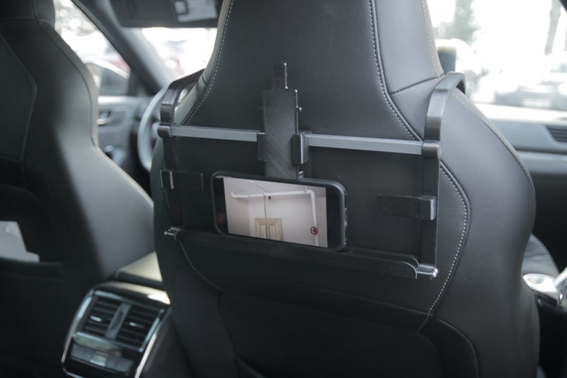 Smartphone holder for sport car seats in black color