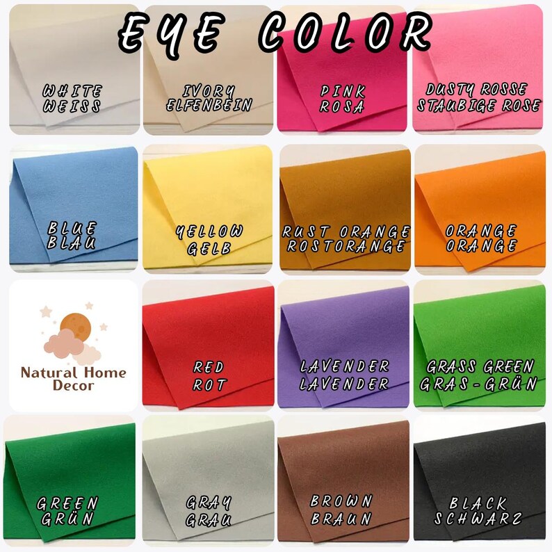 May include: A grid of sixteen felt fabric swatches labeled EYE COLOR, displaying white, ivory, pink, dusty rose, blue, yellow, rust orange, orange, red, lavender, grass green, green, gray, brown, and black, with a Natural Home Decor logo.