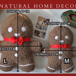 May include: Two gingerbread man plush toys, one large and one small. The large gingerbread man is 15 inches tall and 12 inches wide. The small gingerbread man is 10 inches tall and 12 inches wide. Both gingerbread men are brown and have red and white accents.
