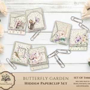 May include: A set of three hidden paperclip sets with a butterfly garden theme. Each set features a mix of bases, pockets, tags, and ephemera. The sets are decorated with floral and butterfly designs, and include paperclips. The text "Butterfly Garden Hidden Paperclip Set" is visible.