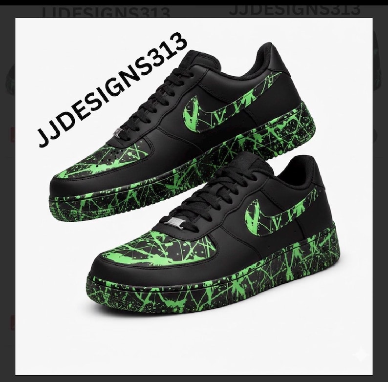May include: Pair of black sneakers with neon green splatter paint design on the soles and accents. The Nike swoosh is neon green. The text "JJDESSIGNS313" is printed on the upper left side of the image.
