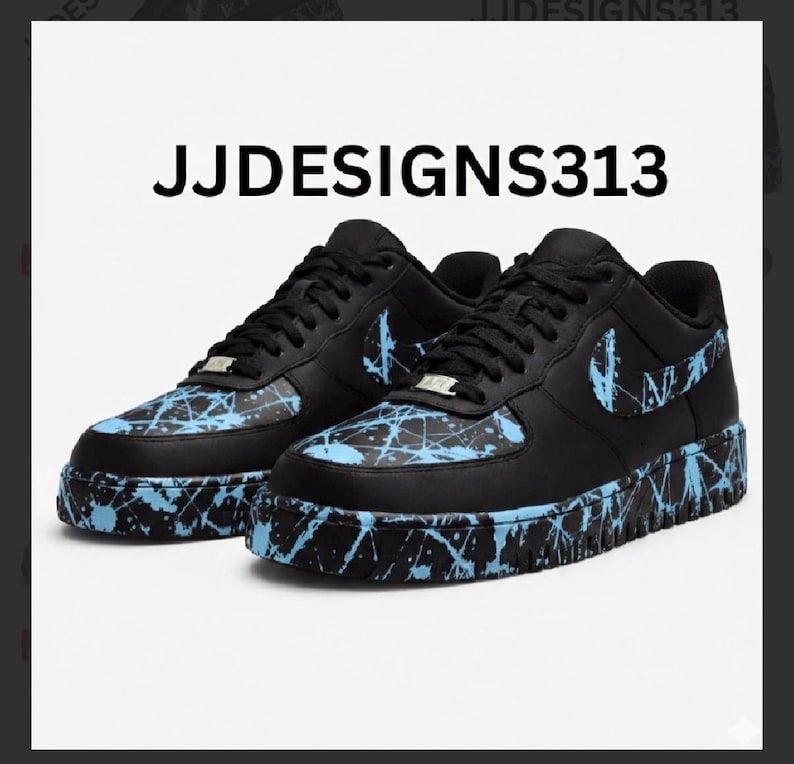 May include: Pair of black sneakers with light blue splatter paint design. The shoes feature the text "JJDESIGNS313" and a light blue Nike swoosh logo on the side.