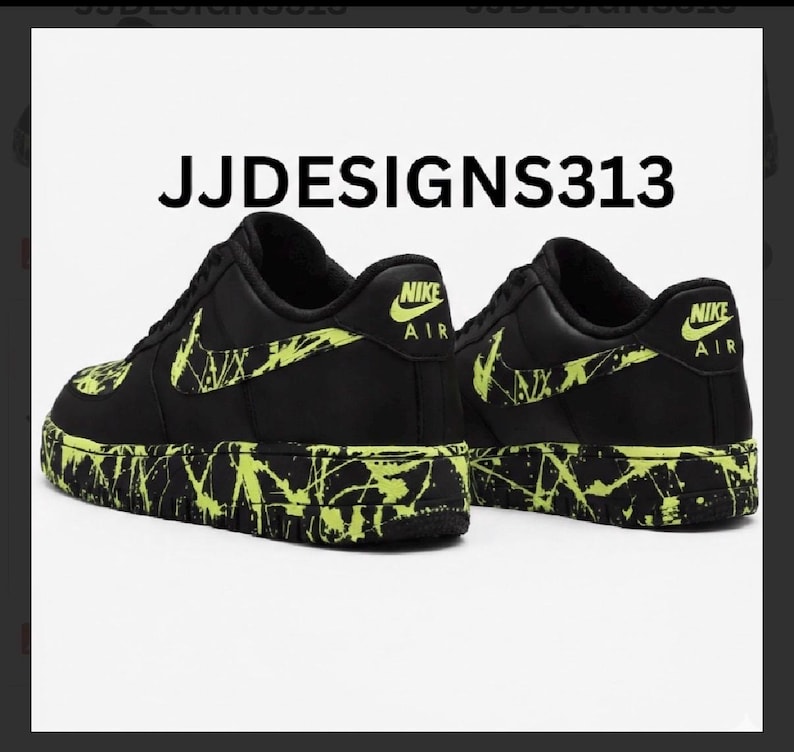 May include: Black Nike Air Force 1 sneakers with neon green splatter paint design on the soles and swoosh. The text "JJDESIGNS313" is displayed above the shoes. The Nike logo is visible on the heel.