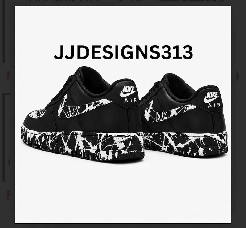 May include: Black and white Nike Air Force 1 sneakers with a splatter paint design on the soles and Nike logo on the heel. The text "JJDESIGNS313" is displayed above the shoes.