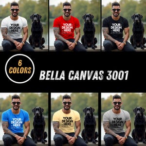Puede incluir: Una maqueta de una camiseta Bella Canvas 3001 en seis colores diferentes: blanco, rojo, negro, azul, amarillo y gris. La camiseta se muestra en un modelo sentado con un perro. El texto en la camiseta dice "Your Design Here".