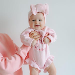 baby knit outfit personalize embroider name pink ruffle custom romper bow announcement photos coming home outfit onesie® baby shower gift