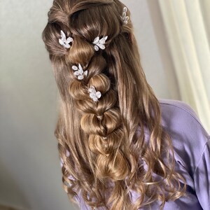 Every pin is slightly different, allowing you to get creative in arranging them in your hair.
