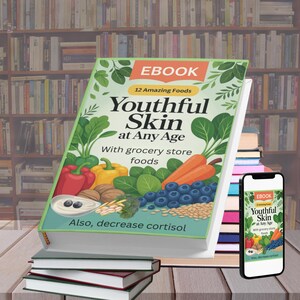 May include: An ebook titled "Youthful Skin at Any Age" with the text "12 Amazing Foods" and "With grocery store foods." The cover features illustrations of vegetables and fruits. A smartphone displays the ebook cover. Several books are stacked in the foreground.