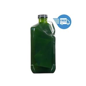 May include: A large green plastic bottle with a black lid and a handle. The bottle is filled with a dark green liquid.