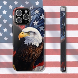 May include: A black phone case with a bald eagle and American flag design. The eagle is perched on a branch with its wings spread. The flag is in the background.