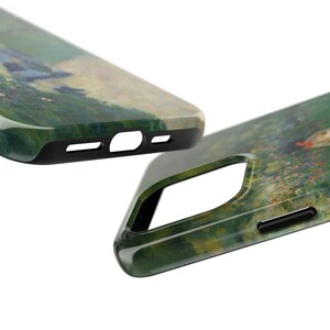 May include: A green, black, and white phone case with a painting of a landscape scene. The case has a raised edge around the camera lens and a cutout for the charging port.