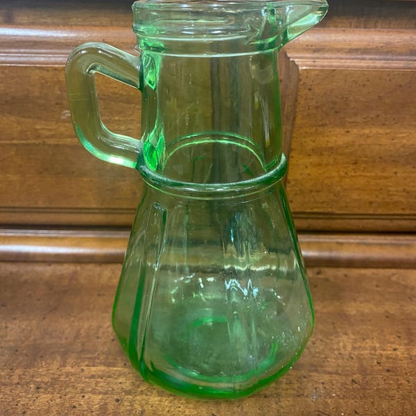 Vintage green uranium glass syrup pitcher (glows under Uv light)
