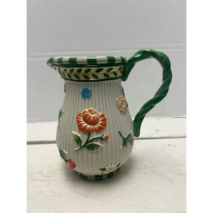 Vintage Ceramic Floral Embossed Pitcher With Green Handle & Striped Rim