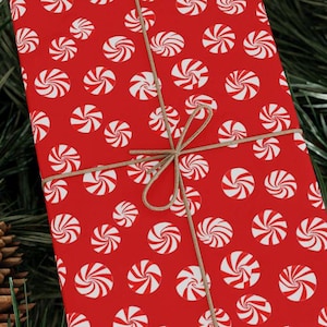 Peppermint Swirl Wrapping Paper Christmas Holiday Gift Wrap Red White Candy Pattern Festive Stylish Paper Perfect for Seasonal Present Candy