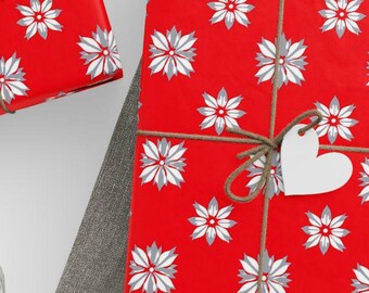 Papel de embrulho festivo com poinsétia vermelha, papel de embrulho para presente festivo, papel sazonal de Natal, design elegante, padrão floral branco, embalagem de presente de luxo