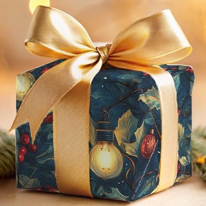 May include: A blue gift box with a gold ribbon and a festive design of holly and lights. The box is sitting on a table with a blurred background of twinkling lights.