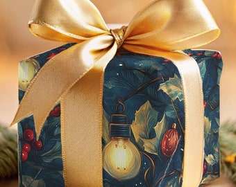 May include: A blue gift box with a gold ribbon and a festive design of holly and lights. The box is sitting on a table with a blurred background of twinkling lights.