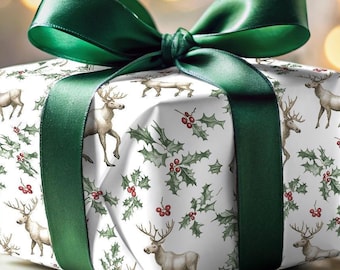 May include: A white gift box with a green ribbon and a pattern of reindeer and holly. The box is wrapped in festive holiday paper.