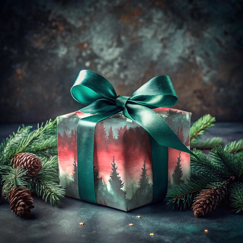 May include: A green and red gift box with a forest scene design. The box is tied with a green satin ribbon and is surrounded by pine branches.
