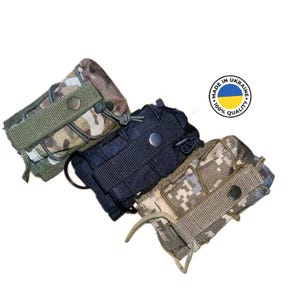 May include: Three different camouflage patterned pouches with black buttons and adjustable straps. The pouches are made in Ukraine and feature a blue and yellow Ukrainian flag.