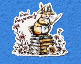 Banned Book Sticker, Read Dangerously – Cute Squirrel Pirate with Sword on Books | Anti Book Ban, Pro-Reading Gift, 3"