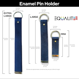 May include: Three navy blue fabric enamel pin holders labeled Extra Large, Large, and Mini. The Extra Large is 11.5 inches long, the Large is 9.5 inches long, and the Mini is 4.5 inches long. Each features a silver metal ring and a metal end cap.