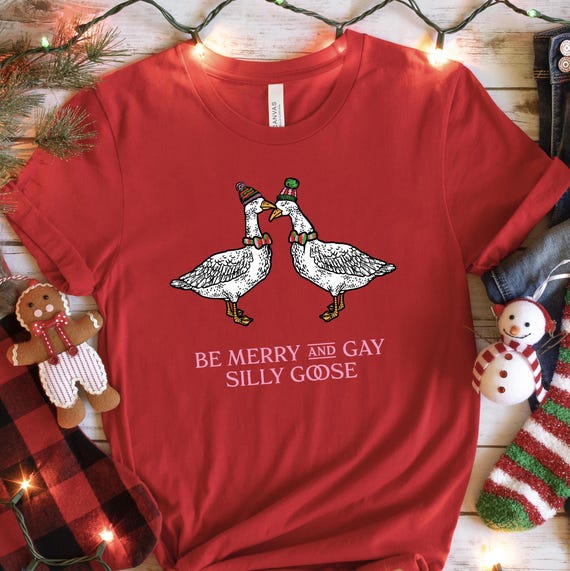 Be Merry and Gay Silly Goose T-Shirt | Funny LGBTQ+ Shirt with Geese in Bow Ties | LGBTQ Gift Under 30 Dollars