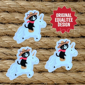May include: Three stickers featuring a black cat wearing a cowboy hat and red scarf riding a light blue unicorn. The stickers are on a textured brown background. The text "ORIGINAL EQUALITEE DESIGN" is in a red starburst.