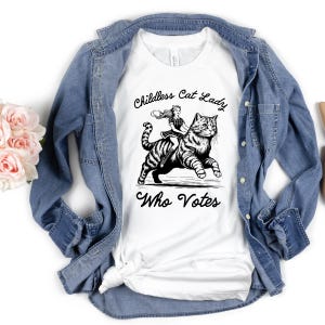 Childless Cat Lady Who Votes Tshirt - Harris Walz Childless Cat Lady Shirt - Woman Riding Cat Shirt