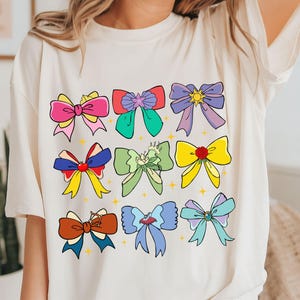 Disney Princess Cute Ribbons And Bows Pastel Colors Logo T-Shirt, Disney Princess Coquette Bow Shirt,Princess Bow Shirt,Disneyland Girly Tee