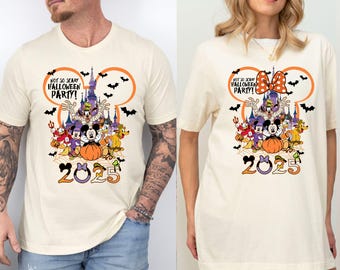 May include: Cream-colored t-shirts featuring a Halloween design with Mickey Mouse, Minnie Mouse, and other Disney characters. The design includes the text "NOT SO SCARY HALLOWEEN PARTY!" and the year "2025". Bats and a pumpkin are also included.